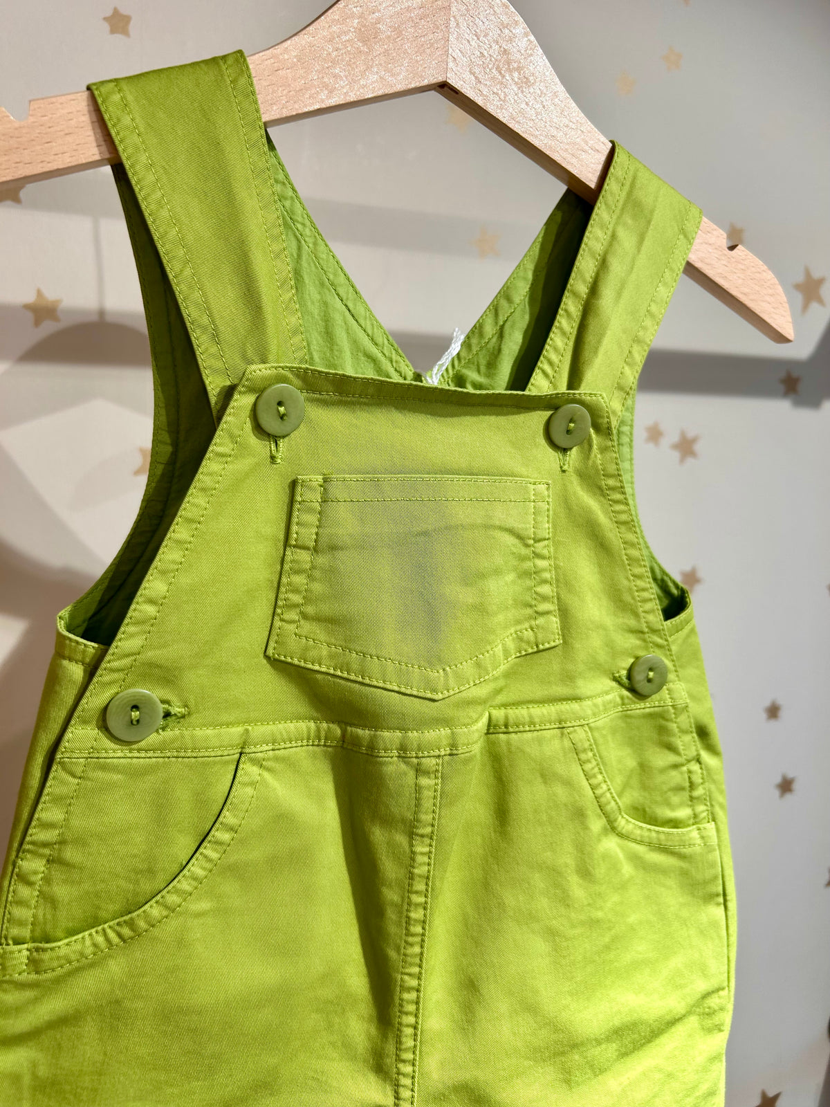 Salopette verde in cotone