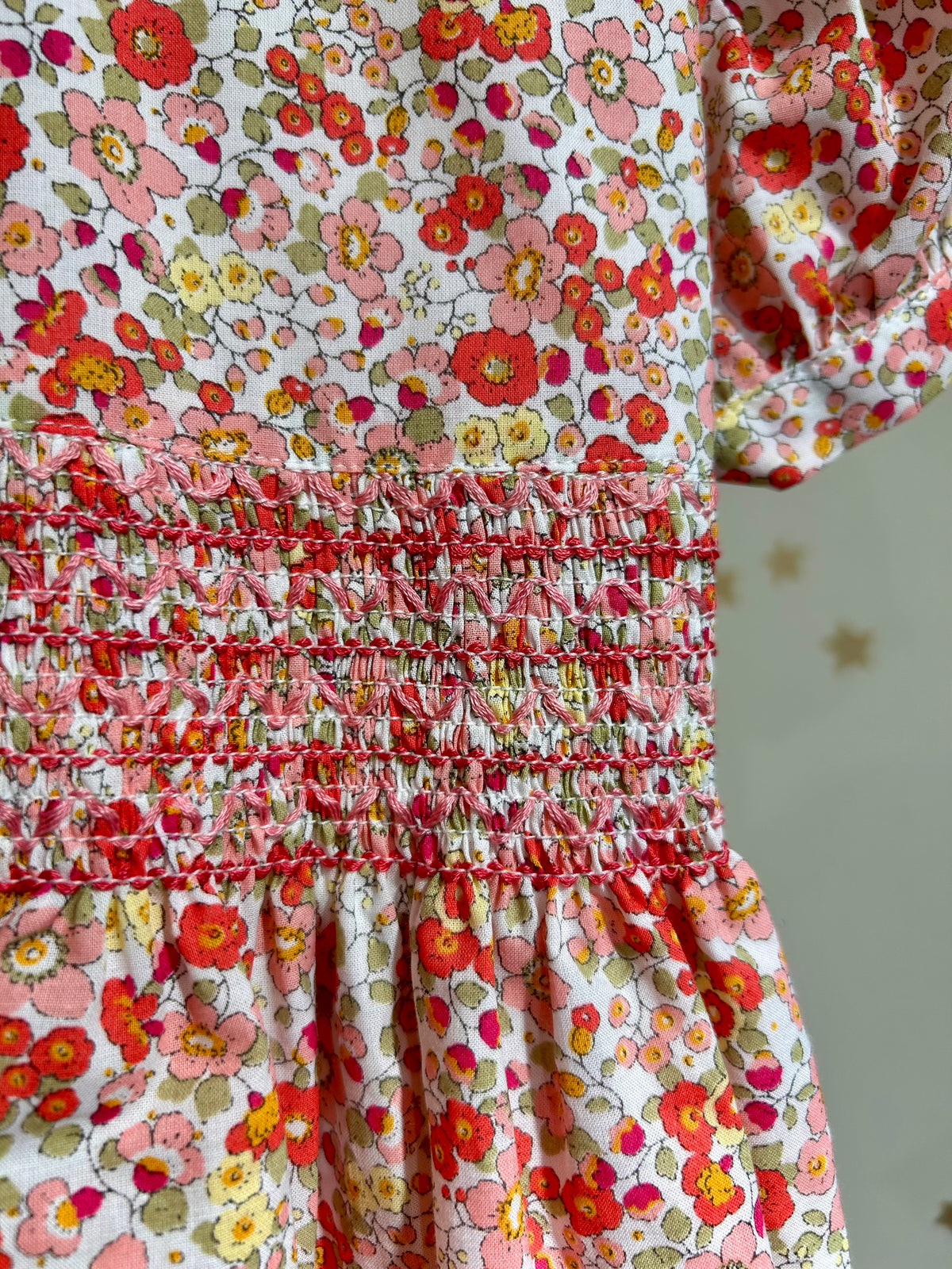 Abito fiori punto smock
