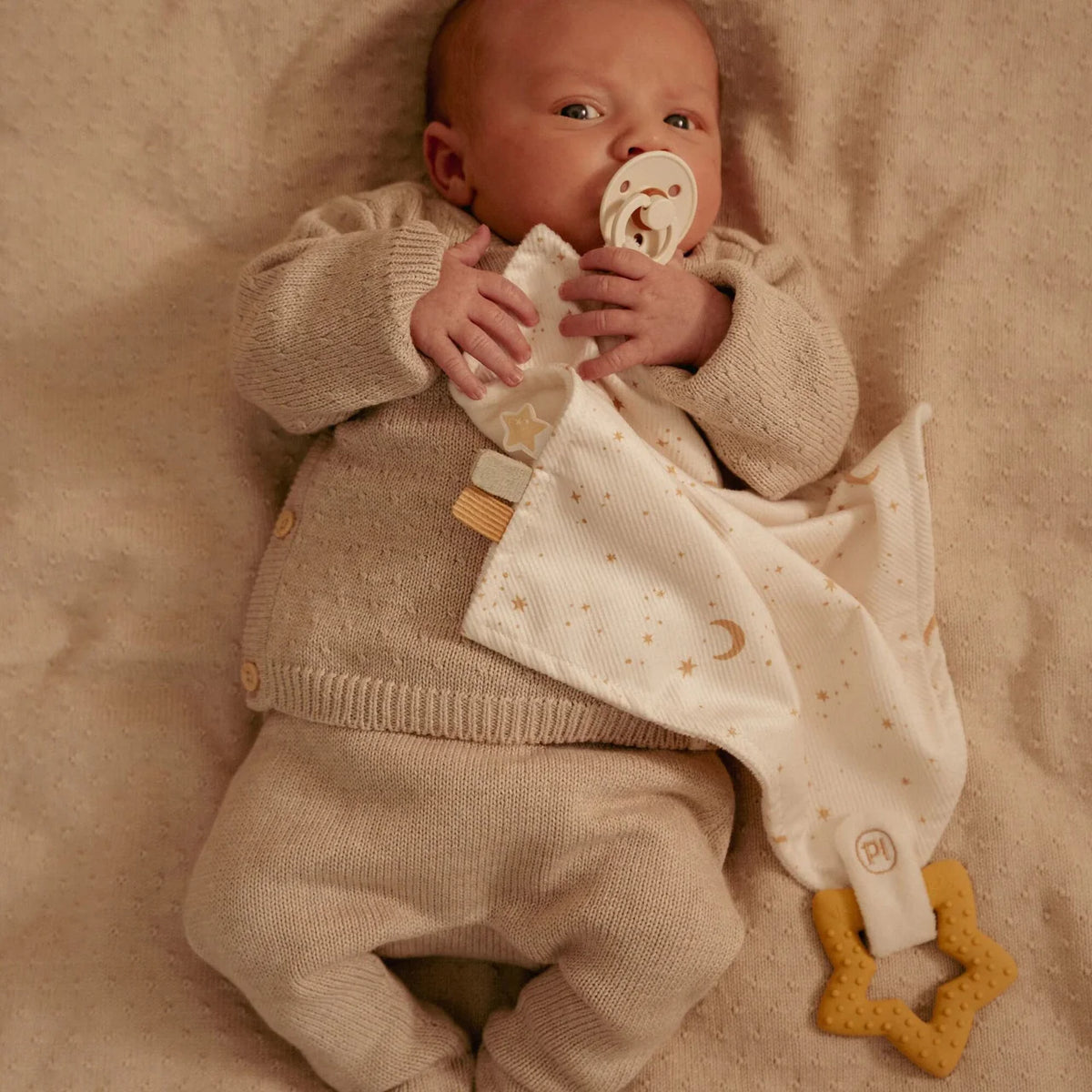 Doudou con gioco da dentizione