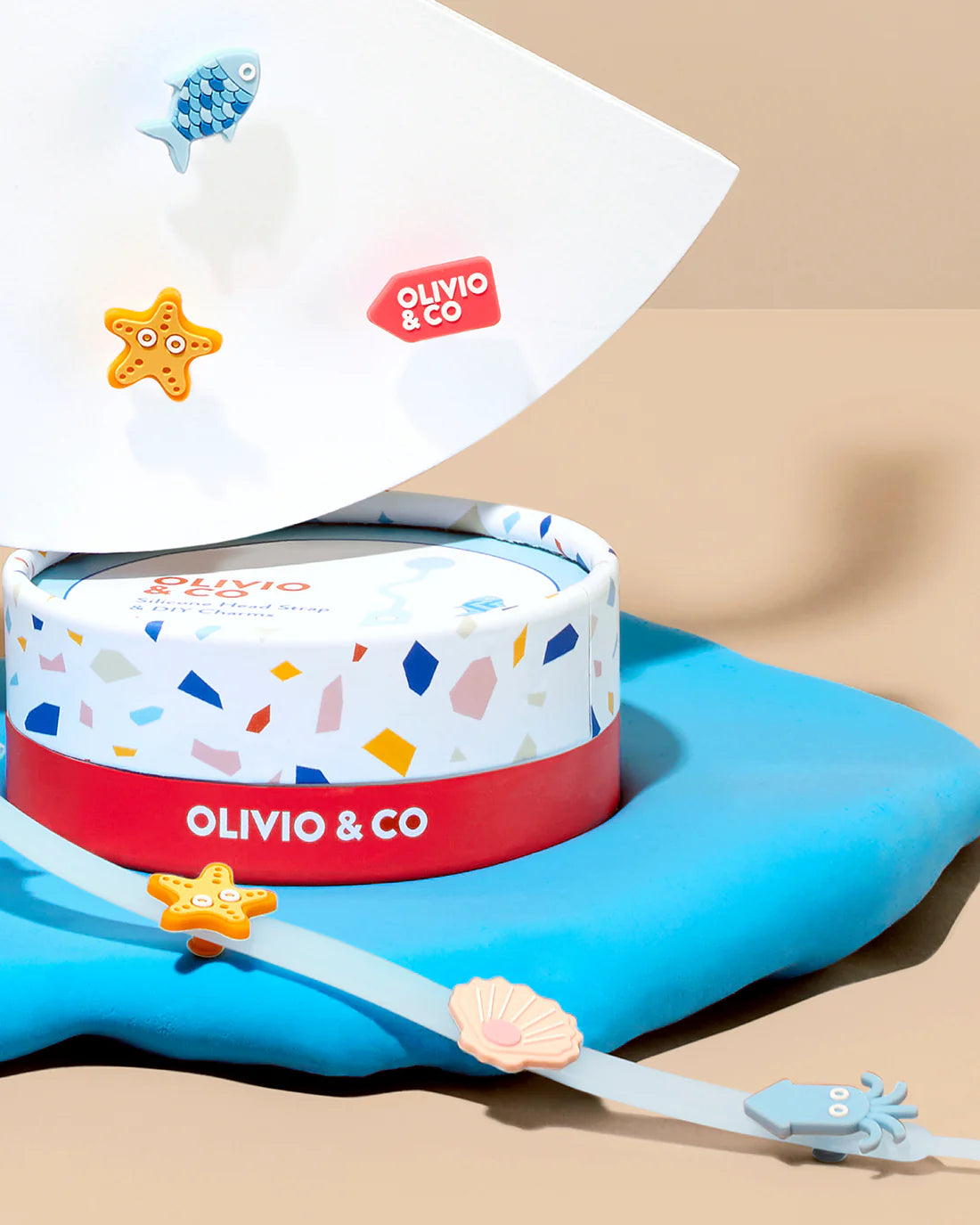 Laccio per occhiali in silicone azzurro con charms