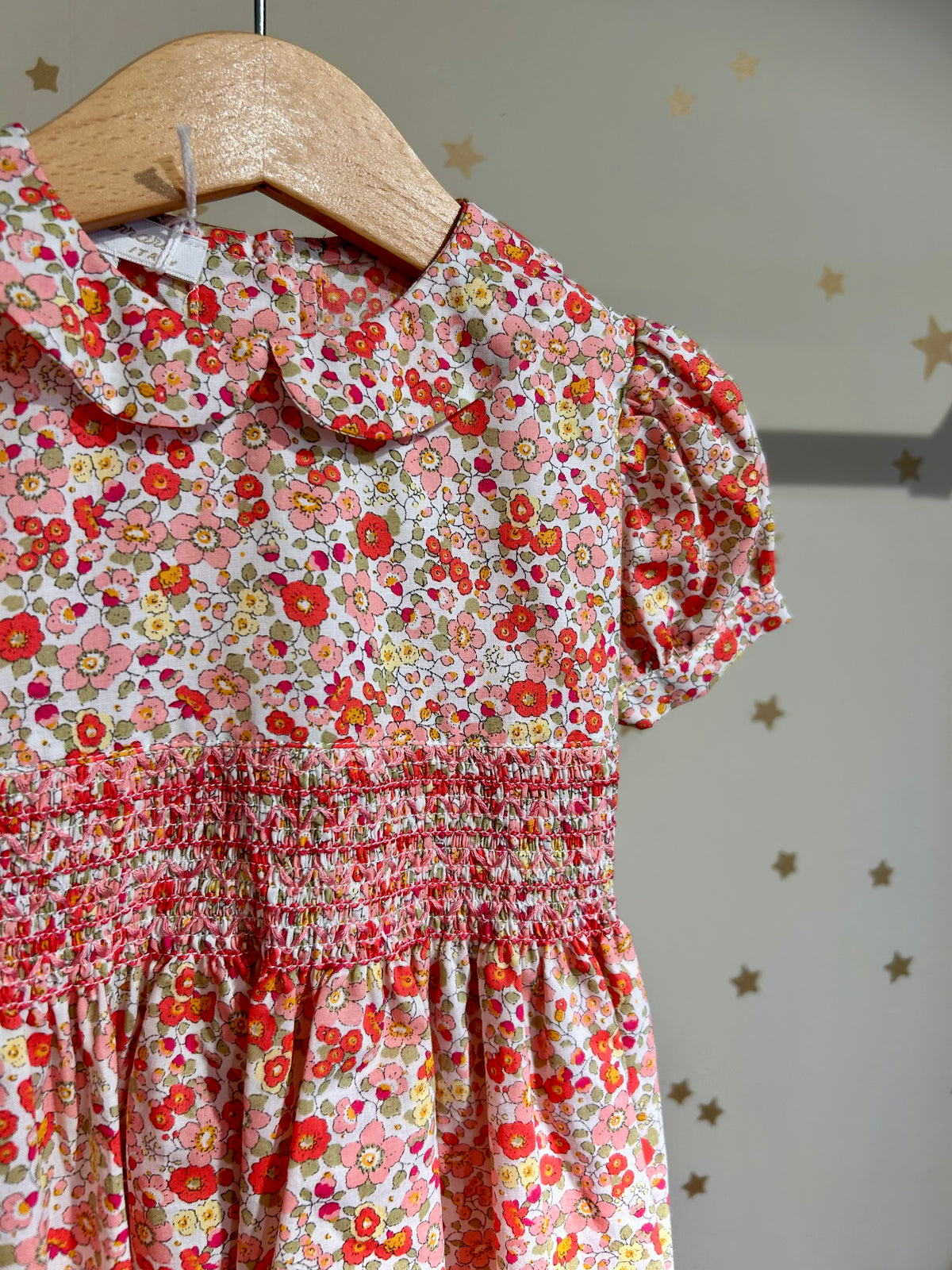 Abito fiori punto smock