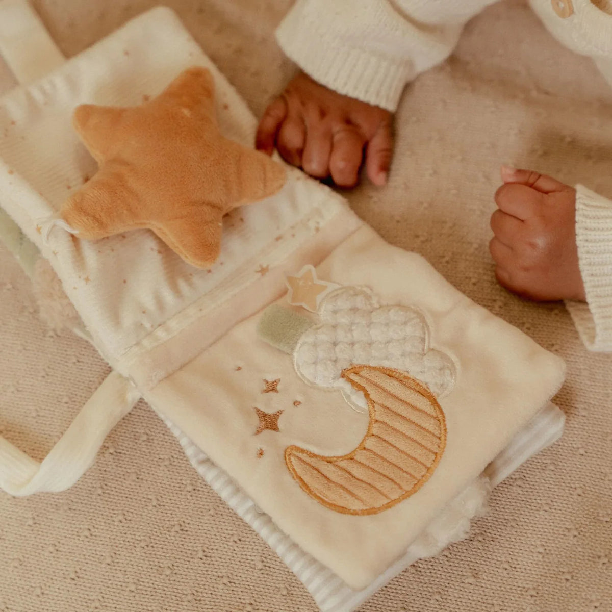 Libro morbido da passeggino Newborn Naturals