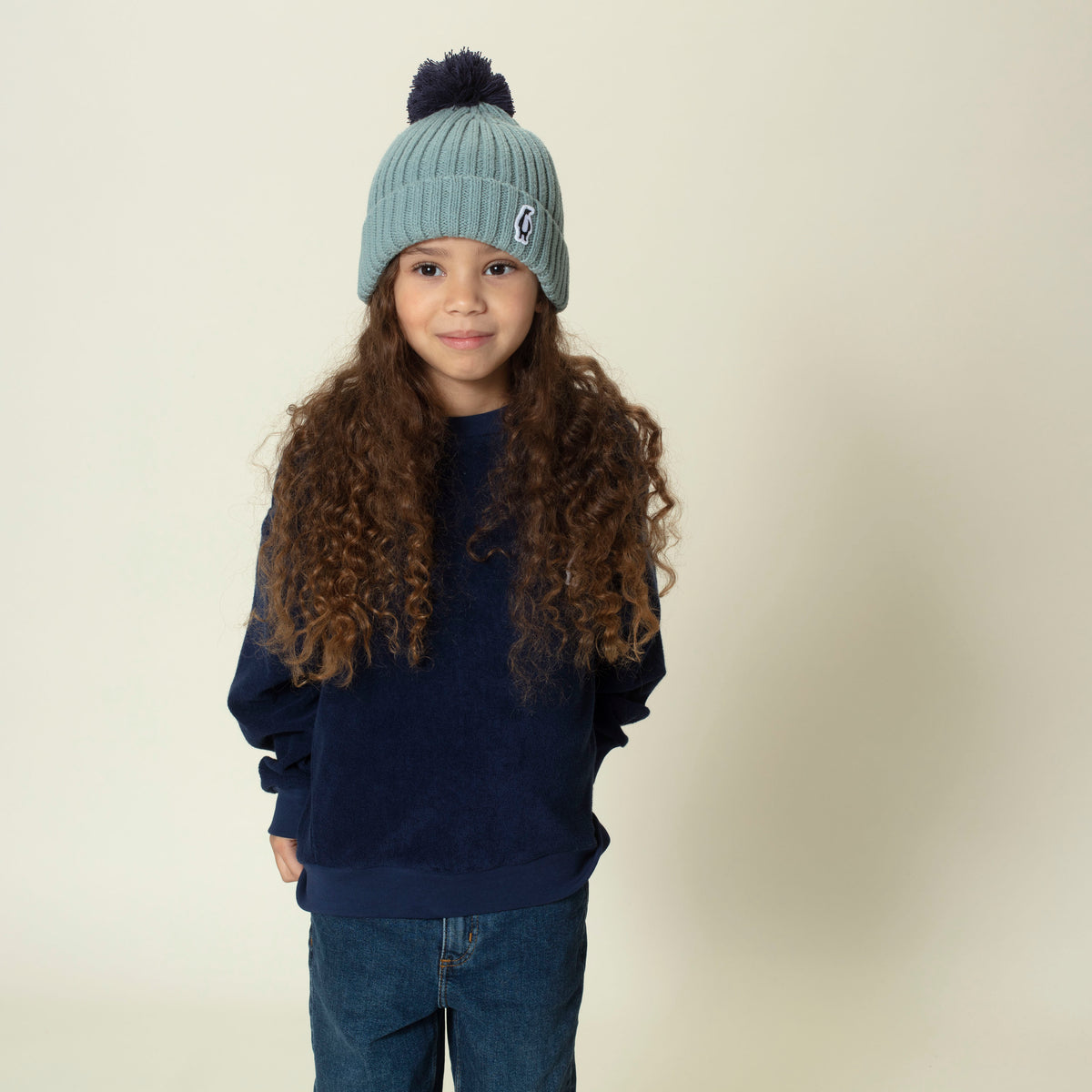 Big Bee light blue pompon hat